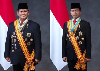 Prabowo dan Gibran memakai jas bertabur lencana tanda bintang kehormatan